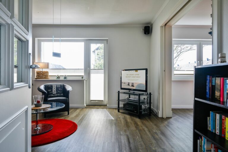 Wohnzimmer mit TV in Ferienwohnung Hörnum