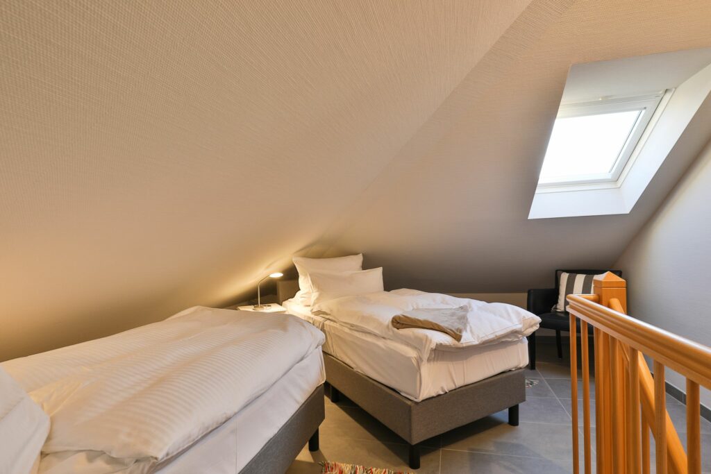 Einzelbetten im Dachgeschoss in Ferienwohnung Hörnum