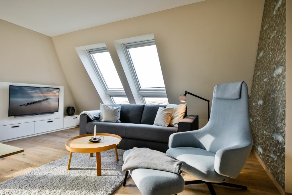 Wohnzimmer mit TV in Ferienwohnung Hörnum