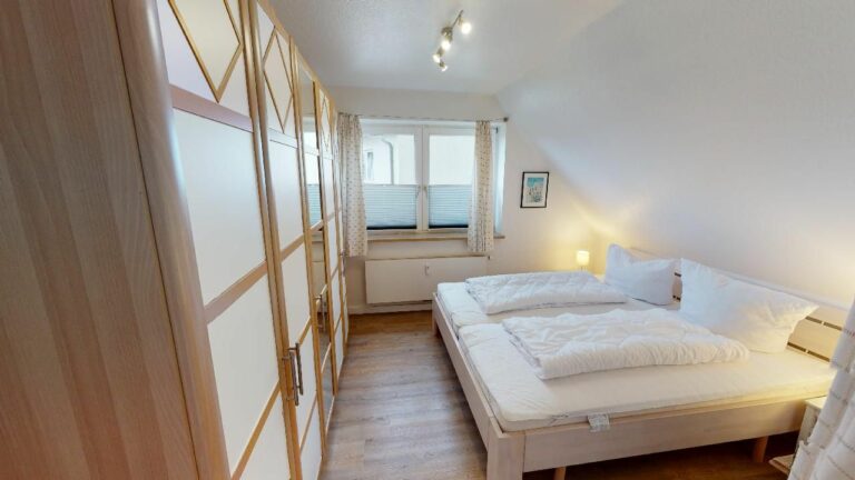 Schlafzimmer in Ferienwohnung Hörnum