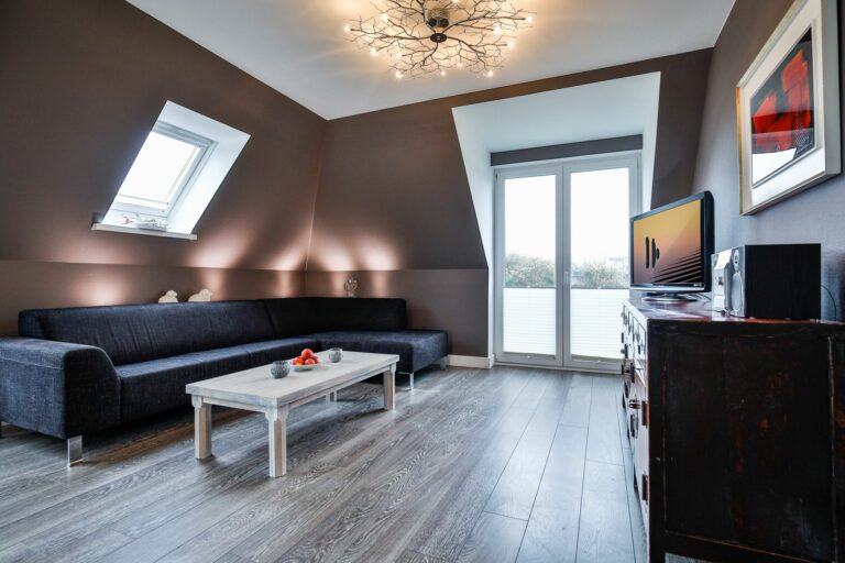 Wohnzimmer mit Sofa in Ferienwohnung Hörnum