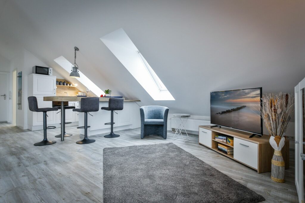 Wohnzimmer mit TV in Ferienwohnung Hörnum