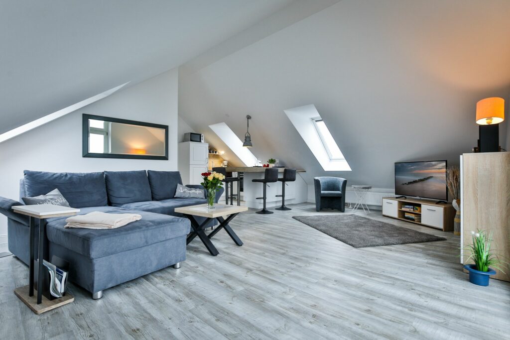 Wohnzimmer mit Sofa in Ferienwohnung Hörnum