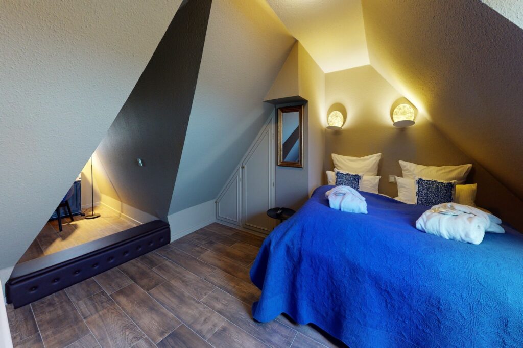 Schlafzimmer im Dachgeschoss in Ferienwohnung Hörnum