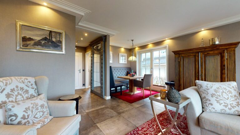 Wohnzimmer mit Sitzecke in Ferienwohnung Hörnum
