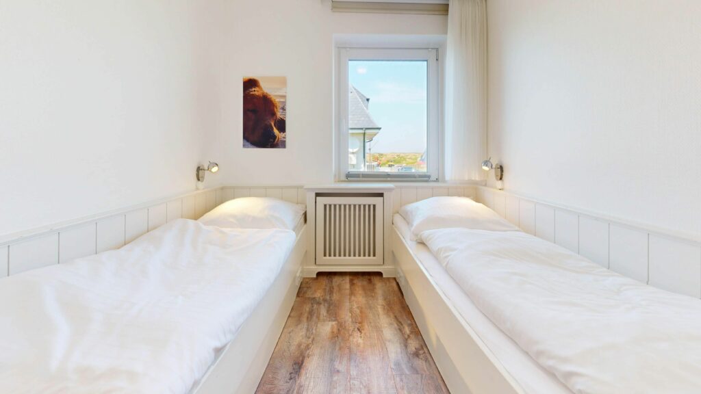 Einzelbetten in Schlafzimmer in Ferienwohnung auf Sylt