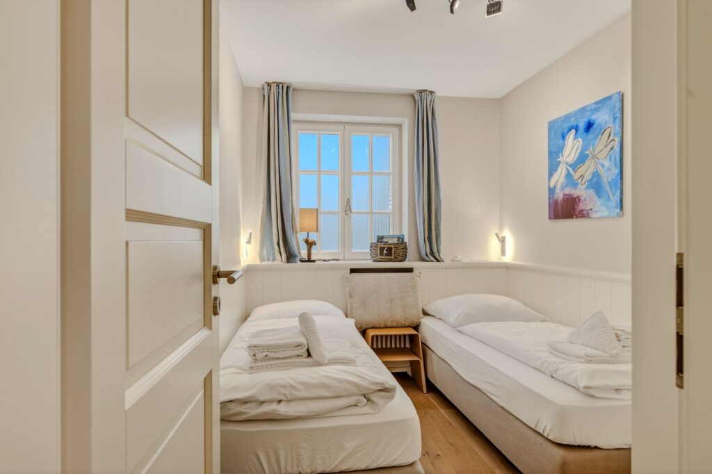 Schlafzimmer einer Ferienwohnung auf Sylt