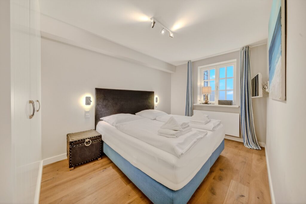 Schlafzimmer einer Ferienwohnung auf Sylt