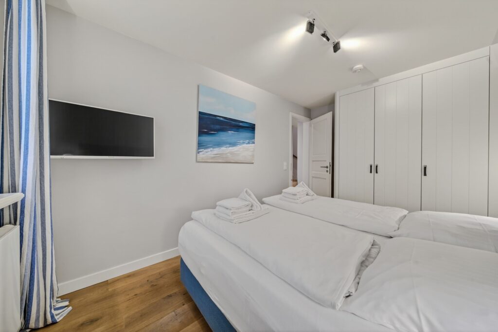 Schlafzimmer einer Ferienwohnung auf Sylt