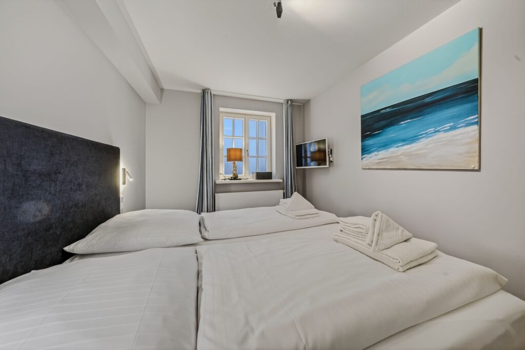 Schlafzimmer einer Ferienwohnung auf Sylt