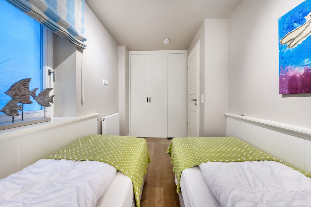 Schlafzimmer einer Ferienwohnung auf Sylt