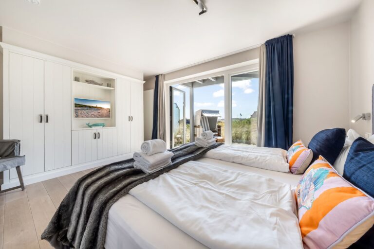 Schlafzimmer einer Ferienwohnung auf Sylt