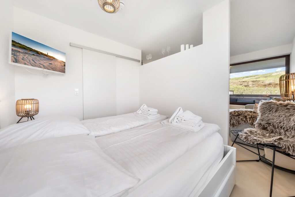 Schlafzimmer einer Ferienwohnung auf Sylt