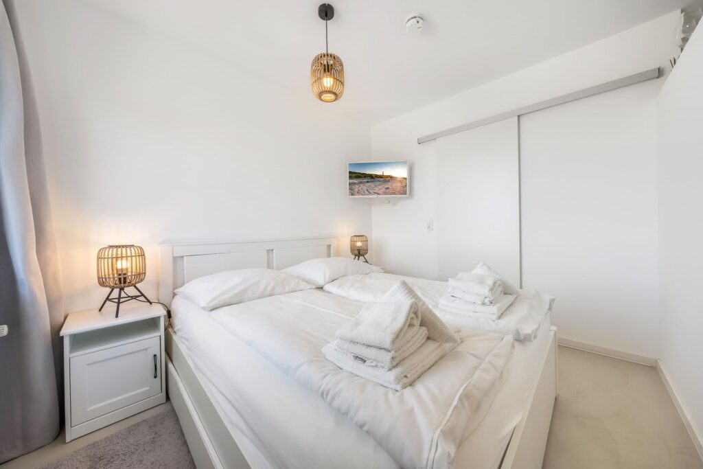 Schlafzimmer einer Ferienwohnung auf Sylt