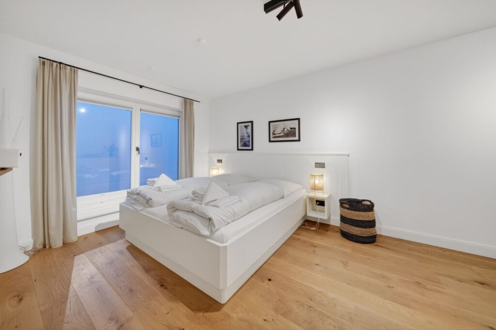 Schlafzimmer einer Ferienwohnung auf Sylt