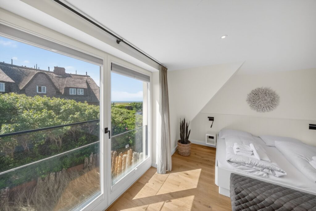 Schlafzimmer einer Ferienwohnung auf Sylt