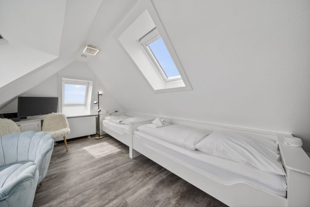 Schlafzimmer einer Ferienwohnung auf Sylt