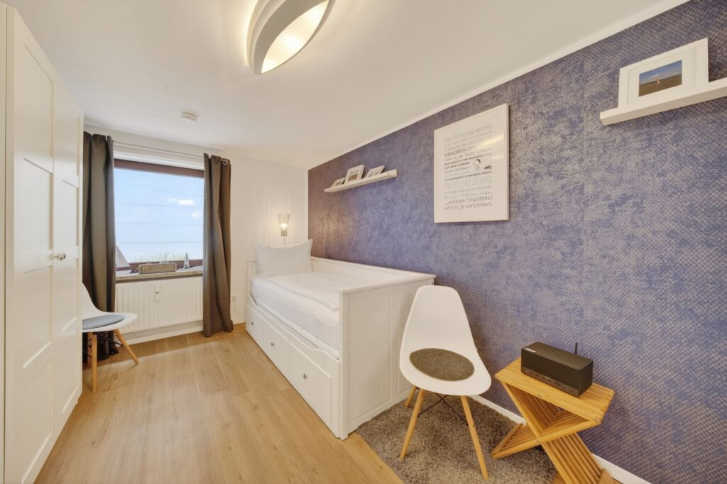Schlafzimmer einer Ferienwohnung auf Sylt