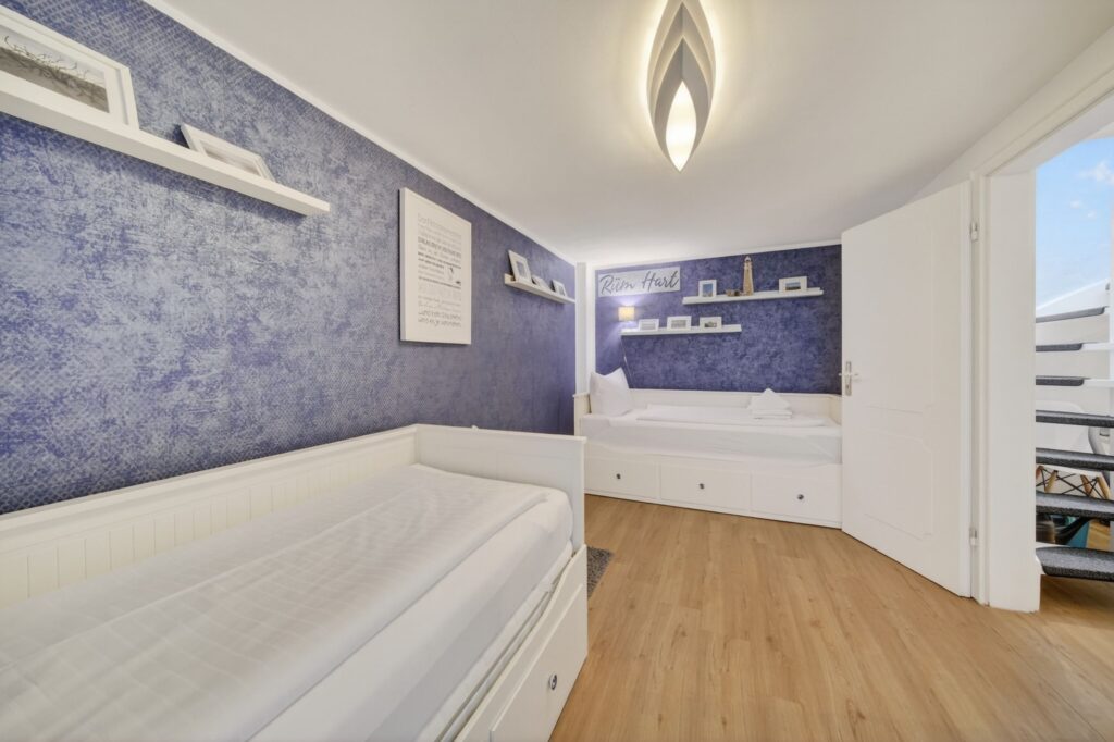 Schlafzimmer einer Ferienwohnung auf Sylt