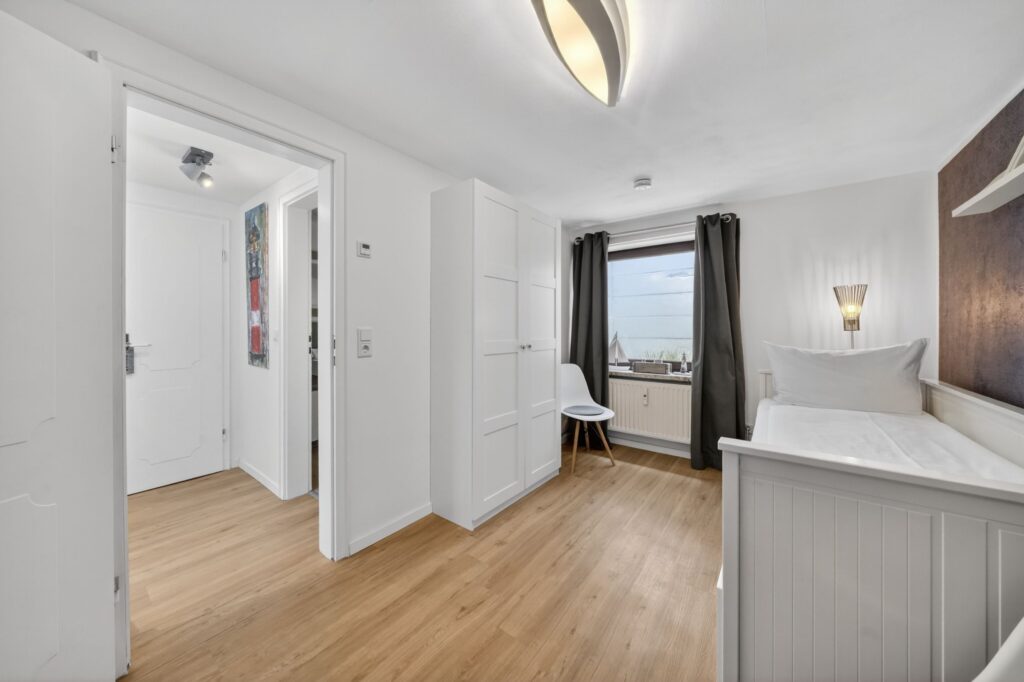 Schlafzimmer einer Ferienwohnung auf Sylt