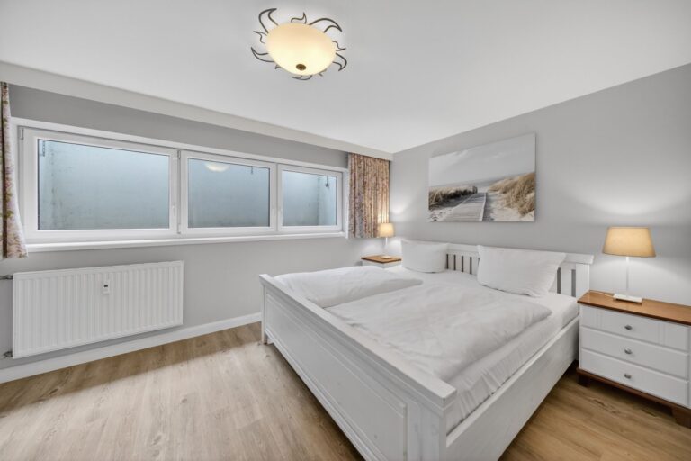 Schlafzimmer einer Ferienwohnung auf Sylt