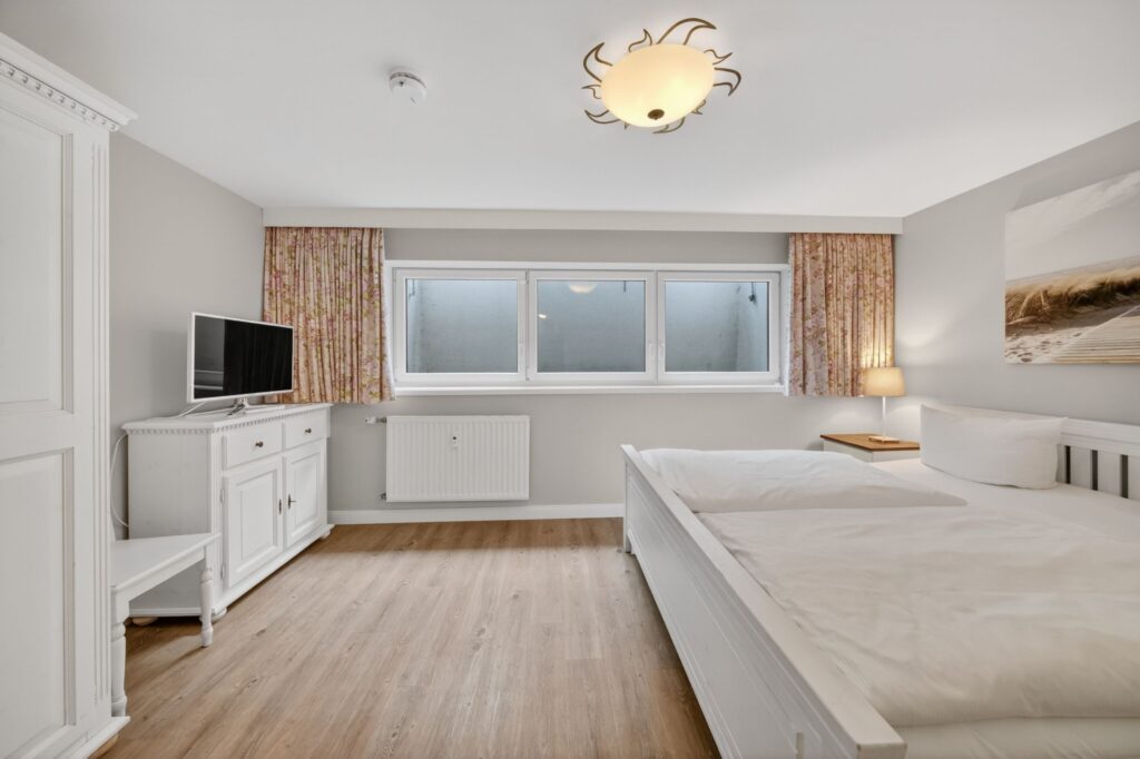 Schlafzimmer einer Ferienwohnung auf Sylt